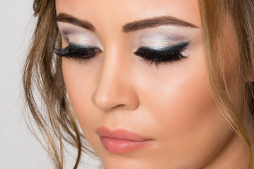 Fototapeta premium Portrait of girl close-up with trendy makeup