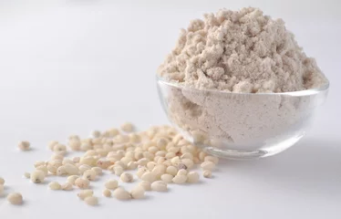 Wandcirkels aluminium Sorghum grains and flour - alternative gluten-free flour. Isolated on white © akvals