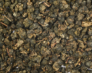 Surface coated with tea leaves
