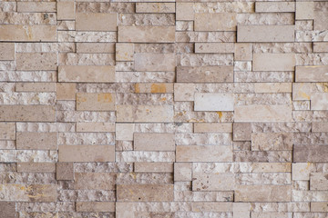 Brown modern stone wall background/texture.