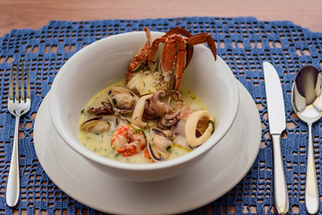creamy soup with seafood