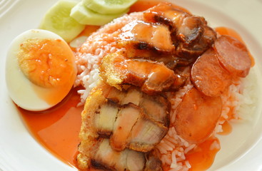 crispy pork and egg dressing sweet red sauce on rice