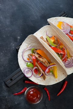 Tortillas with freshly made fajitas, top view with copy space