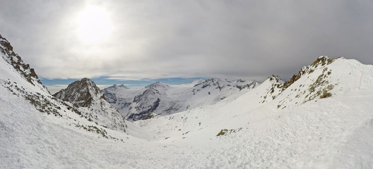 Fantastic view at the arrival of the cable car Presena to the glacier Adamello, Lobbie, Presanella...