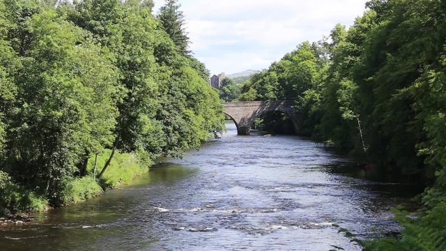 Timelapse of Traffic passing over Teith Bridge with Doune Castle, Scotland