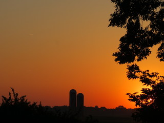 sunrise with silos © Lea