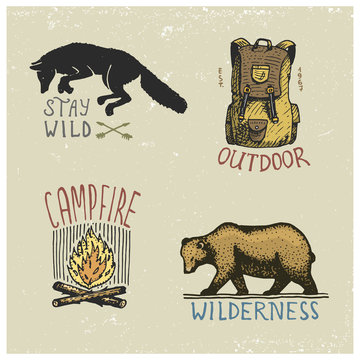 set of engraved vintage, hand drawn, old, labels or badges for camping, hiking, hunting with wild wolf, grizzly bear, capmfire, backpack bag
