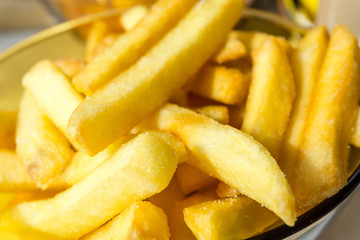 Golden French fries potatoes ready to be eaten