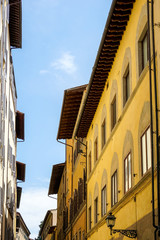Beautiful street view of ancient buildings at old town near the Cathedral of Florence, Italy