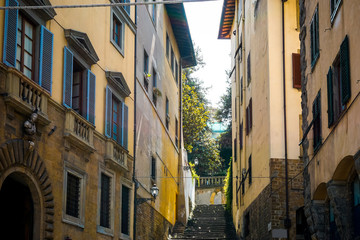 Fototapeta premium Beautiful street view of ancient buildings at old town near the Cathedral of Florence, Italy