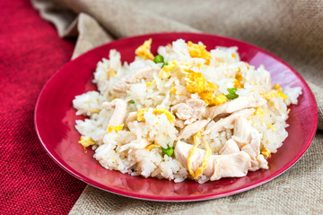 Homemade Chinese fried rice with vegetables and fried eggs