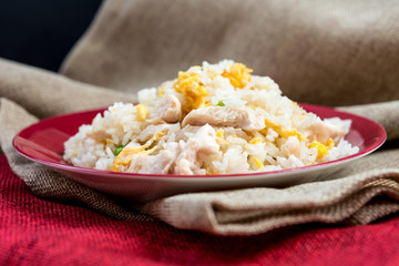Homemade Chinese fried rice with vegetables and fried eggs