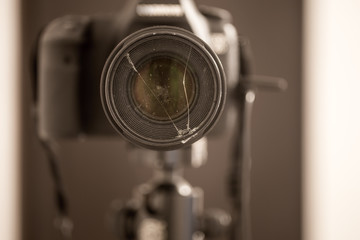 camera close up with broken glass on the lens