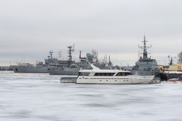 The ships of the Baltic Fleet of the Navy of Russia on the winter parking in the Petrovskaya harbor. Kronstadt