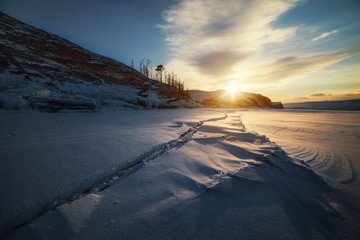Baikal winter sunset near the island Ogoy