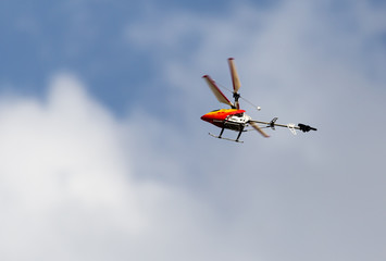 Fototapeta na wymiar children's helicopter in the sky