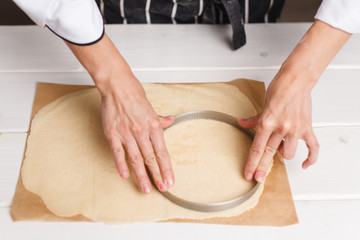 preparing dough for tart