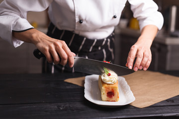 cutting cupcake filled with decorated