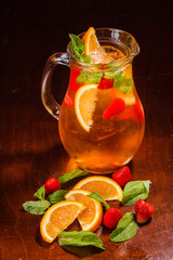 Coctail in a glass with raw fruit