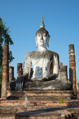 Obraz premium Ancient sculpture of a sitting Buddha close up. Ruins of the Buddhist temple Wat Mahathat. Sukhothai. Thailand