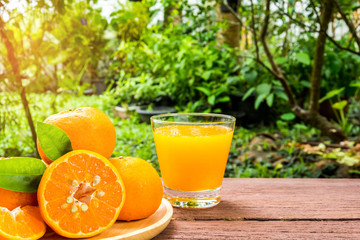 Orange juice on a wooden table
