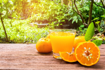 Orange juice on a wooden table