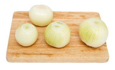 onions on a board on a white background