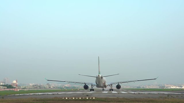 4K Jet Airplane Prepares For Take Off From The National Airport. A Commercial Passenger Aircraft Start Up On Runway. Plane fly by day time-Dan