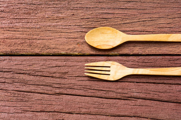 Spoon fork wood on table