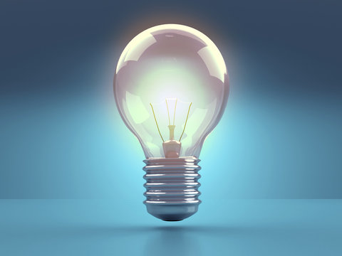 Light bulb illuminate on blue background.