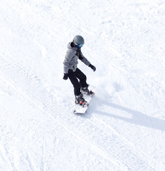 Fototapeta na wymiar man snowboarding in winter