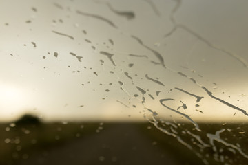 raindrops on a windshield of car