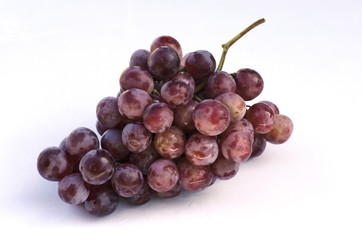 Red grape fruits macro close up Isolated on white backgrounds