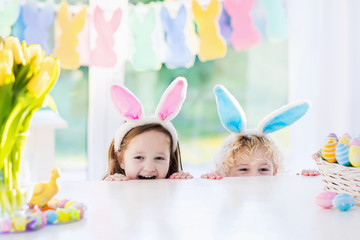 Kids with bunny ears on Easter egg hunt