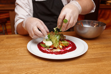 Chef is making appetizer