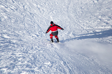 Naklejka na ściany i meble man skiing in winter