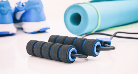 Fitness equipment on white background