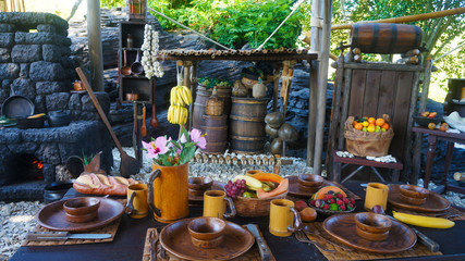 Table with food in an old hut