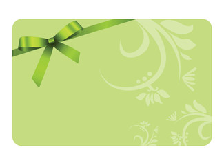 Card with Shiny Green Satin Gift Bow Close up, has space for text on green  background
