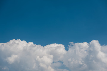 Naklejka na ściany i meble Cumulus cloud on blue sky