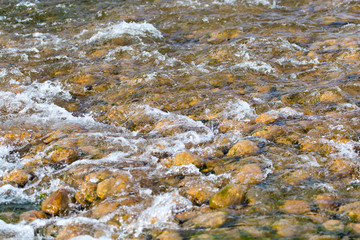 stones in the river as a backdrop