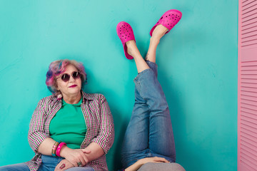 Contemporary parents and children with bright clothes and stylish hair