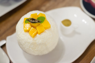 Refreshing iced mango dessert on top view