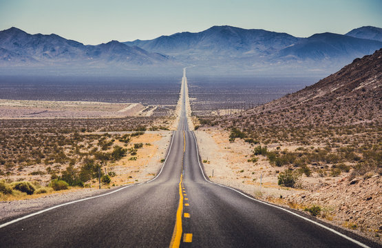 Endless straight highway in the American Southwest, USA