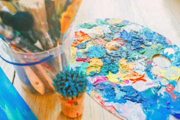 Art and love. Magic colors moments. Working space workshop top view from above. Workshop