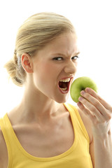 Woman with a fresh green apple