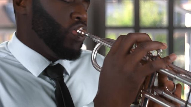 Black Trumpet Player. Musician With Closed Eyes.