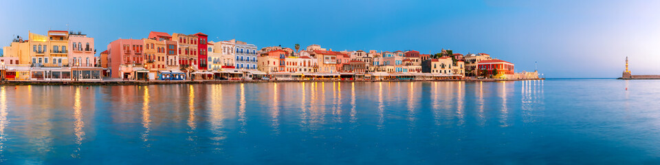Picturesque panoramic view of old harbour with Lighthouse of Chania at sunrise, Crete, Greece - obrazy, fototapety, plakaty