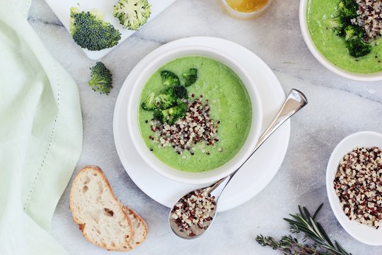 Broccoli soup with quinoa topping. Super foods and clean eating concept.Selective focus