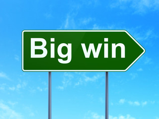 Business concept: Big Win on road sign background